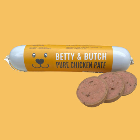 Roll of Betty & Butch Pure Chicken Pate on a yellow background