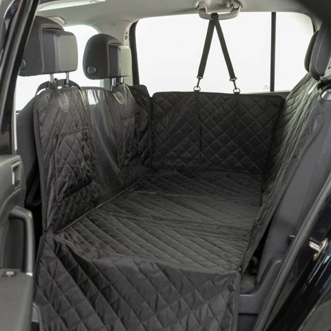 Car interior with a black quilted bench cover