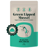 Green lipped mussel powder sprinkled over pet food, showcasing its use as a joint support supplement for dogs and cats.
